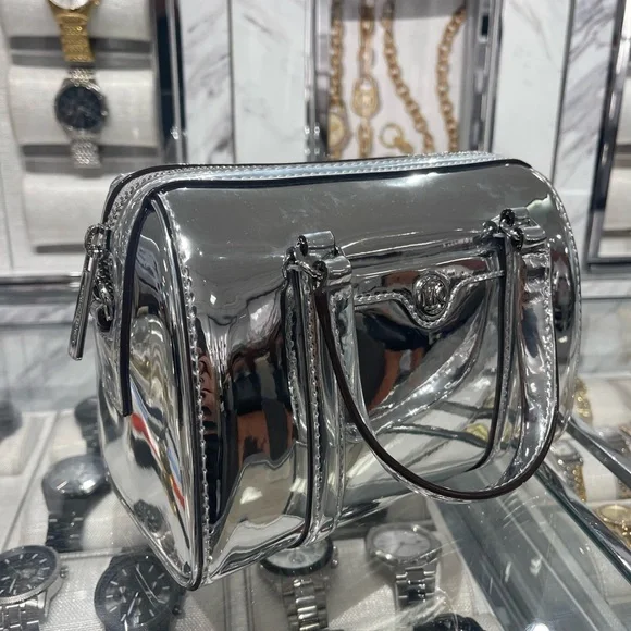 MICHAEL KORS Jet Set Small Patent Duffel Xbody Crossbody Bag
Silver 
NWT - Picture 16 of 16